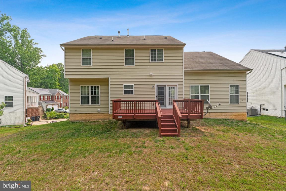 10103 Rolling Green Way Fort Washington, MD 20744 - Photo 39 of 39 a view of a house with a yard and sitting area