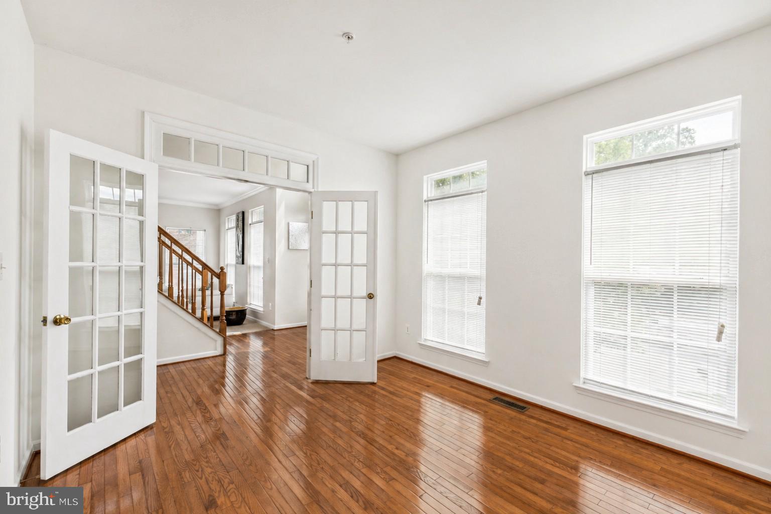 10103 Rolling Green Way Fort Washington, MD 20744 - Photo 6 of 39 a view of entryway with wooden floor and stairs
