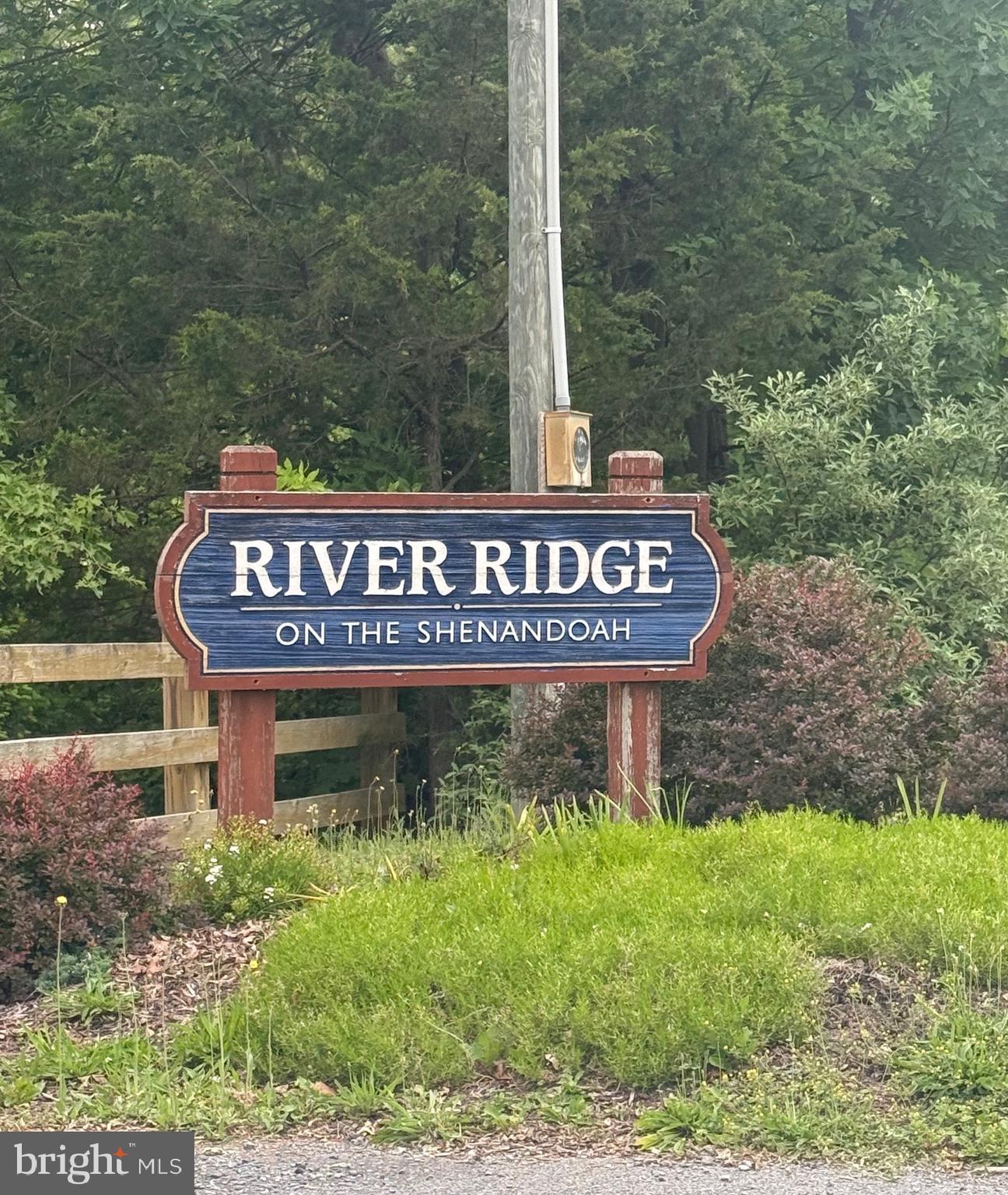 0 River Ridge Drive Middletown, VA 22645 - Photo 24 of 33 a sign broad in front of the red brick house