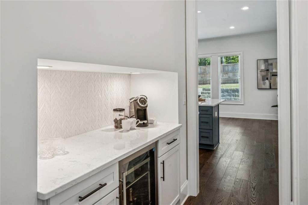 4081 Longleaf Lane Tucker, GA 30084 - Photo 13 of 49 a kitchen with a sink and a refrigerator