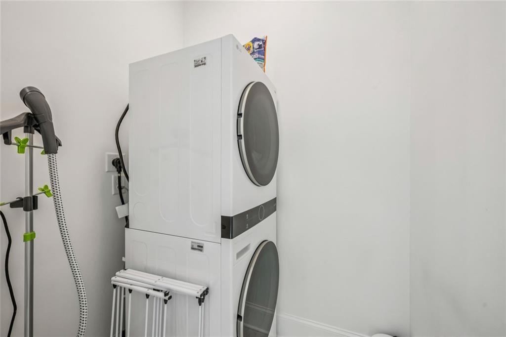 4081 Longleaf Lane Tucker, GA 30084 - Photo 23 of 49 a utility room with dryer and washer