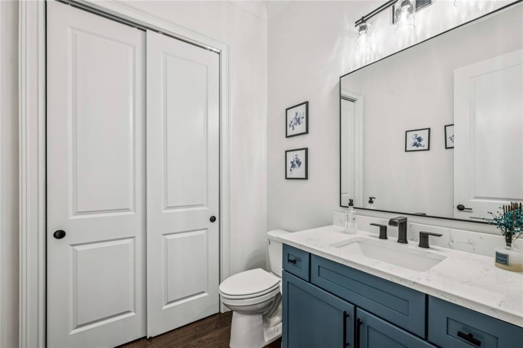 4081 Longleaf Lane Tucker, GA 30084 - Photo 24 of 49 a bathroom with a granite countertop sink toilet and mirror