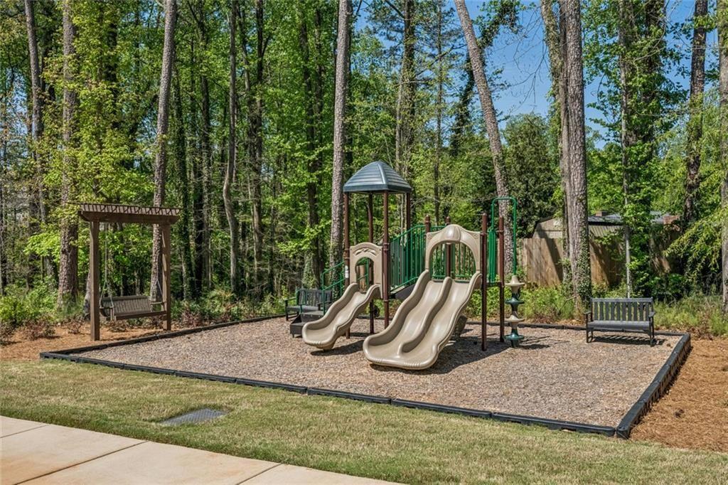 4081 Longleaf Lane Tucker, GA 30084 - Photo 43 of 49 a view of a park with slide