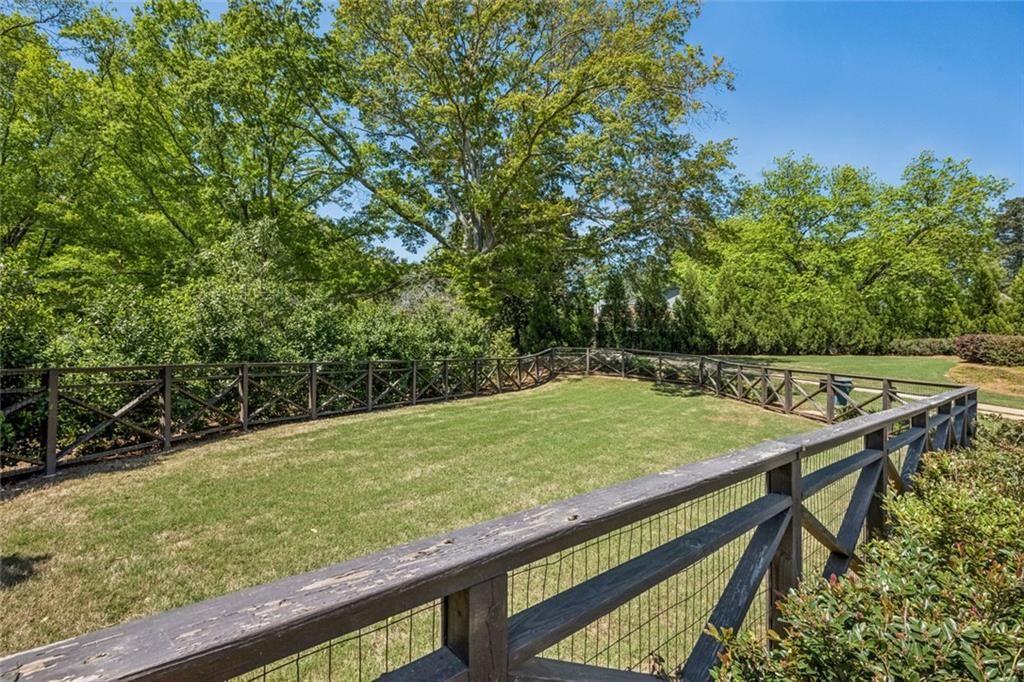 4081 Longleaf Lane Tucker, GA 30084 - Photo 47 of 49 a view of a backyard with a wooden deck