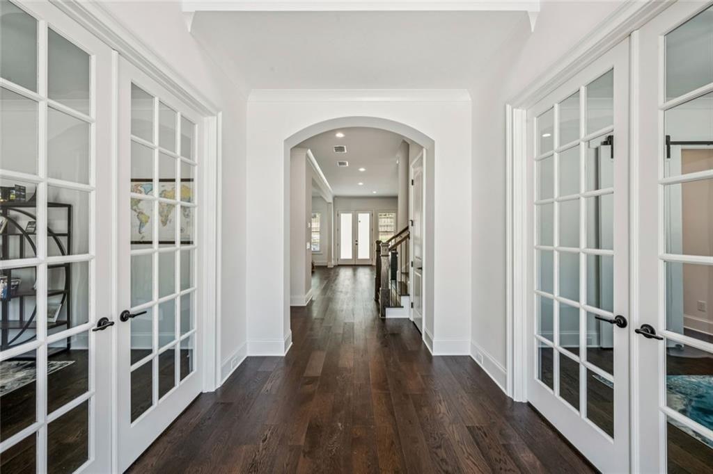 4081 Longleaf Lane Tucker, GA 30084 - Photo 6 of 49 wooden floor in a hall with a window and wooden floor