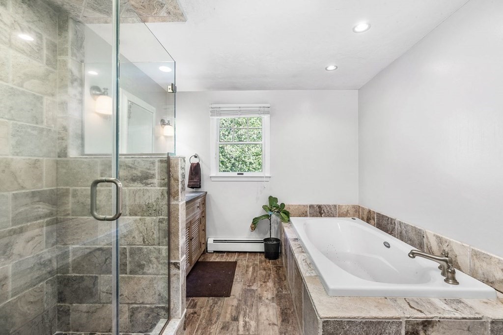 18 Guide Post Pth Path Marshfield, MA 02050 - Photo 13 of 31 a bathroom with a tub shower and sink