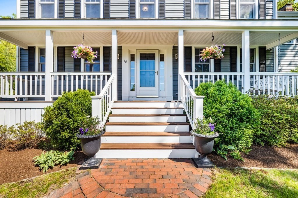 18 Guide Post Pth Path Marshfield, MA 02050 - Photo 2 of 31 a view of a house with potted plants and a bench