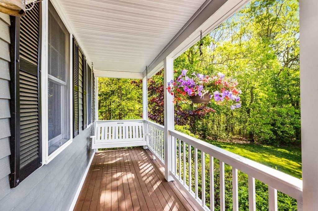18 Guide Post Pth Path Marshfield, MA 02050 - Photo 23 of 31 a view of porch with wooden floor