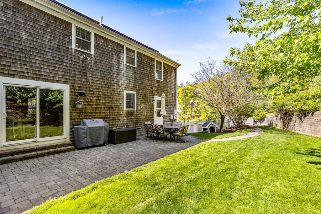 18 Guide Post Pth Path Marshfield, MA 02050 - Photo 25 of 31 a front view of a house with a yard