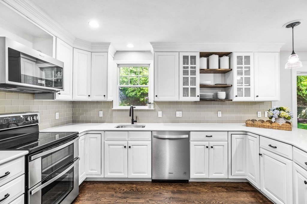 18 Guide Post Pth Path Marshfield, MA 02050 - Photo 4 of 31 a kitchen with stainless steel appliances granite countertop a sink and cabinets