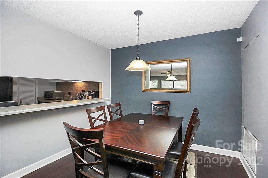 1612 Sharon Road West Charlotte, NC 28210 - Photo 11 of 25 a view of a dining room with furniture and window