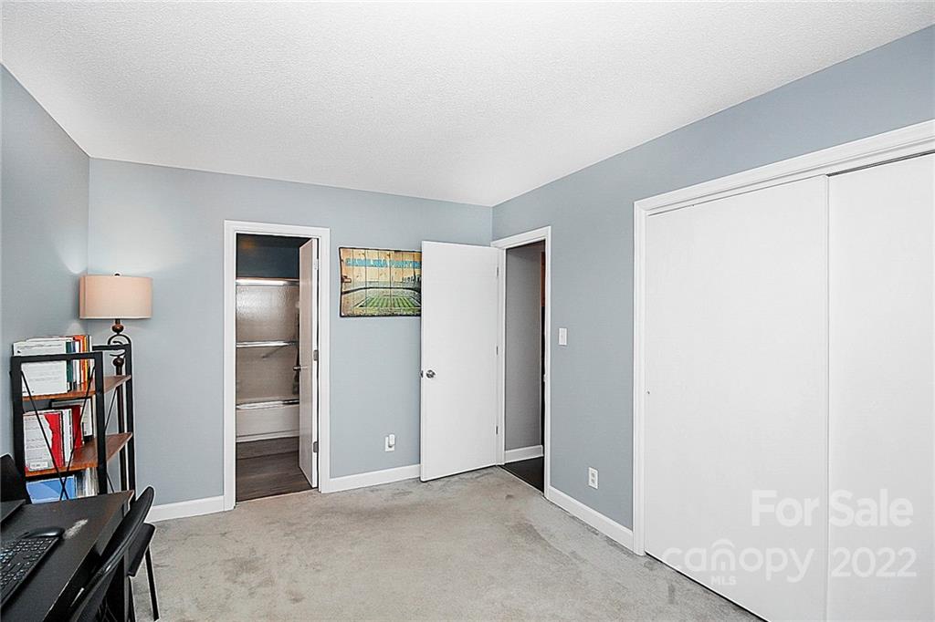 1612 Sharon Road West Charlotte, NC 28210 - Photo 23 of 25 a view of a livingroom with a refrigerator cabinet and a window