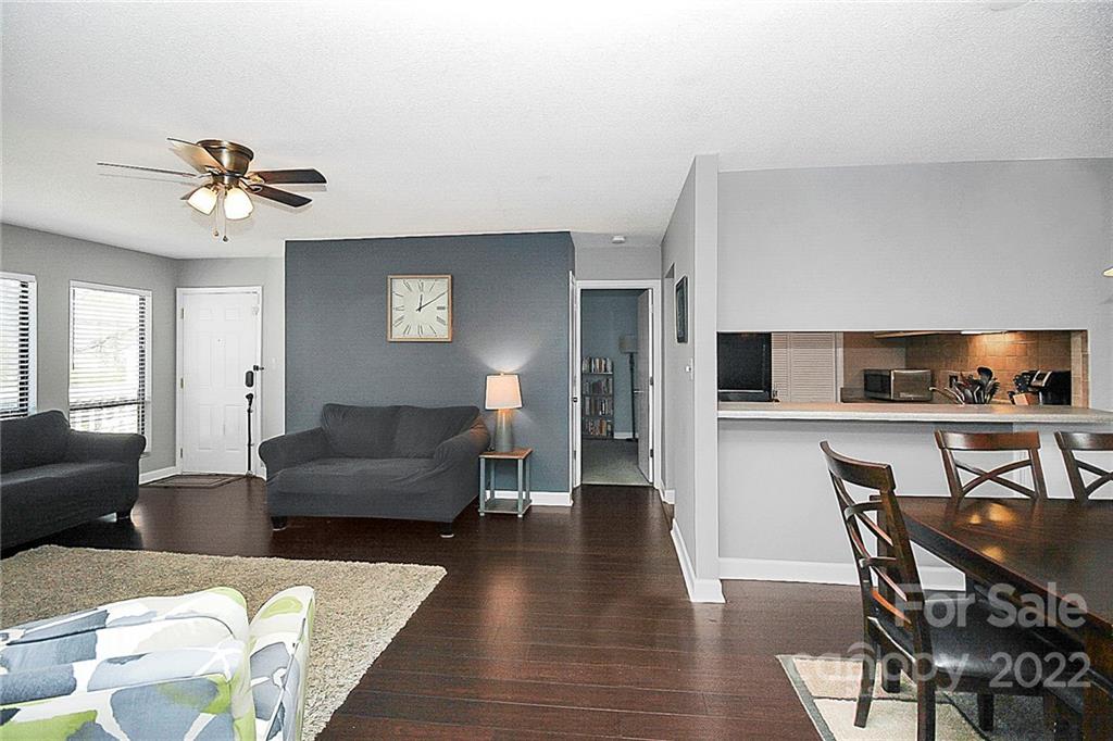 1612 Sharon Road West Charlotte, NC 28210 - Photo 6 of 25 a living room with furniture and wooden floor