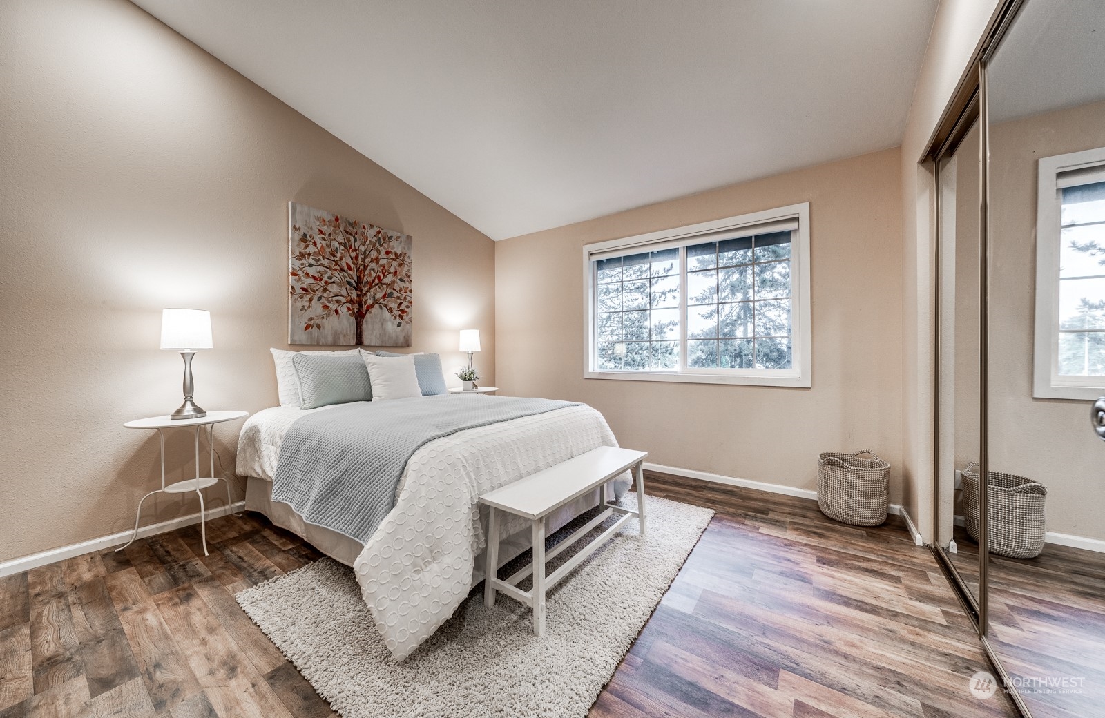 8512 242nd Street Southwest, Unit 9 Edmonds, WA 98026 - Photo 16 of 26 a bedroom with a bed and a window