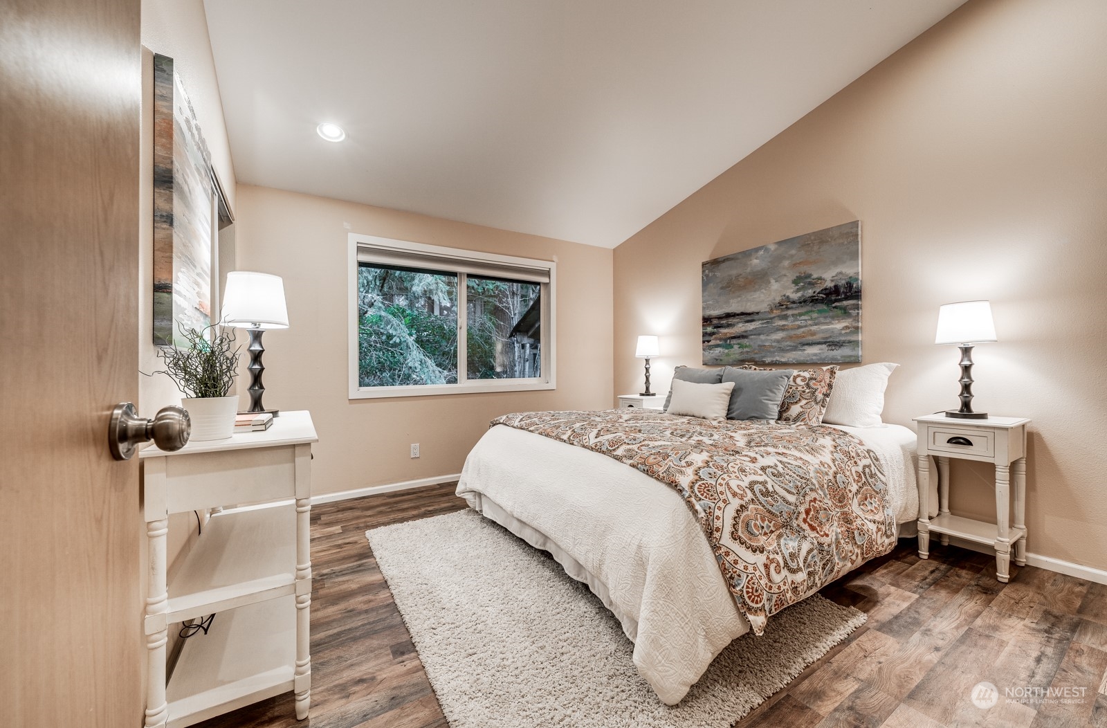 8512 242nd Street Southwest, Unit 9 Edmonds, WA 98026 - Photo 21 of 26 a bedroom with a bed and window