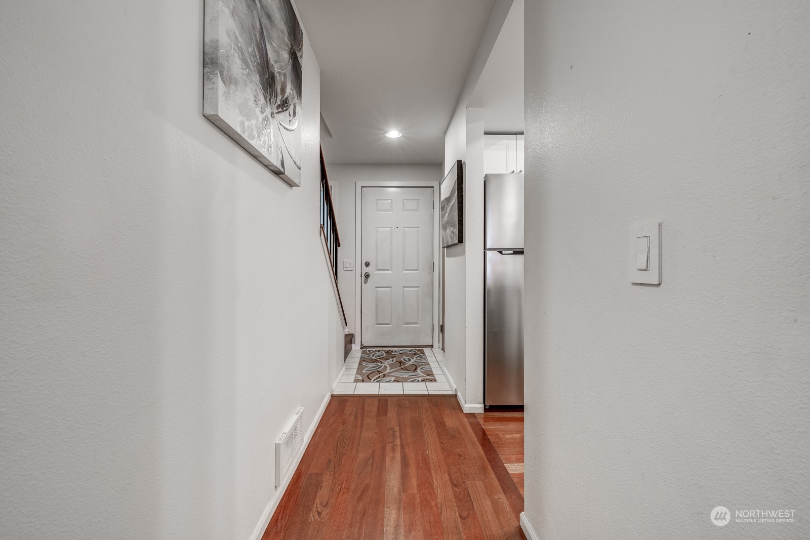 8512 242nd Street Southwest, Unit 9 Edmonds, WA 98026 - Photo 3 of 26 a view of entryway with wooden floor