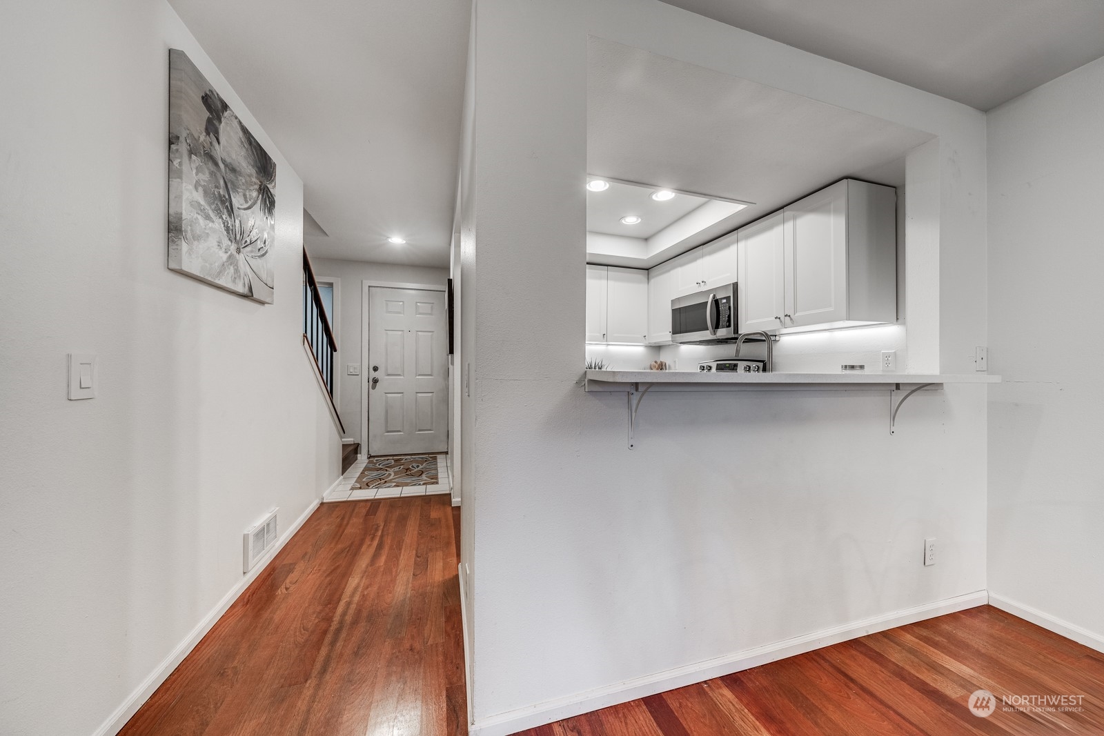 8512 242nd Street Southwest, Unit 9 Edmonds, WA 98026 - Photo 9 of 26 a view of kitchen and microwave
