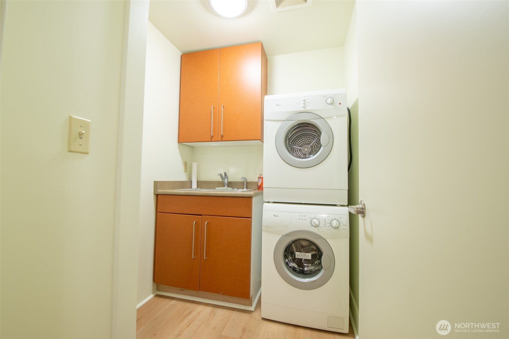 1550 Eastlake Avenue East, Unit 201 Seattle, WA 98102 - Photo 13 of 30 a utility room with dryer and washer