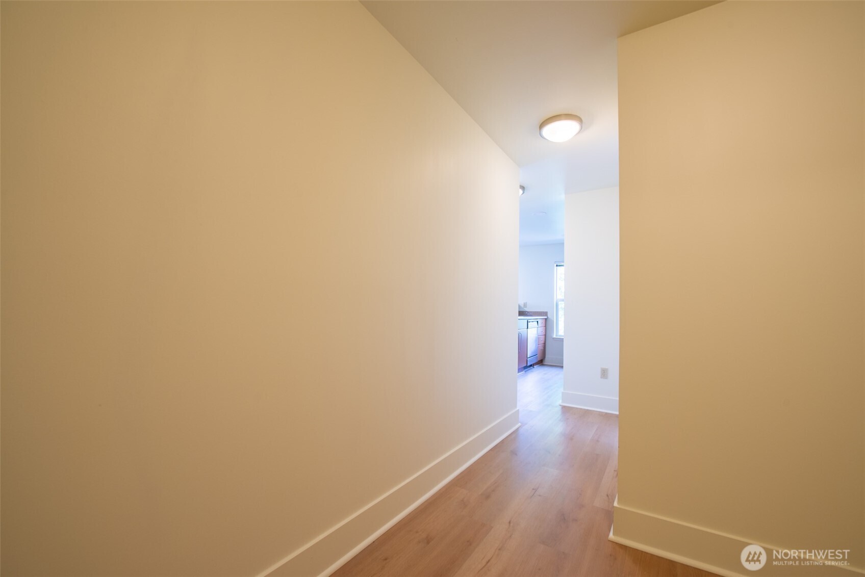 1550 Eastlake Avenue East, Unit 201 Seattle, WA 98102 - Photo 14 of 30 a view of a room with wooden floor