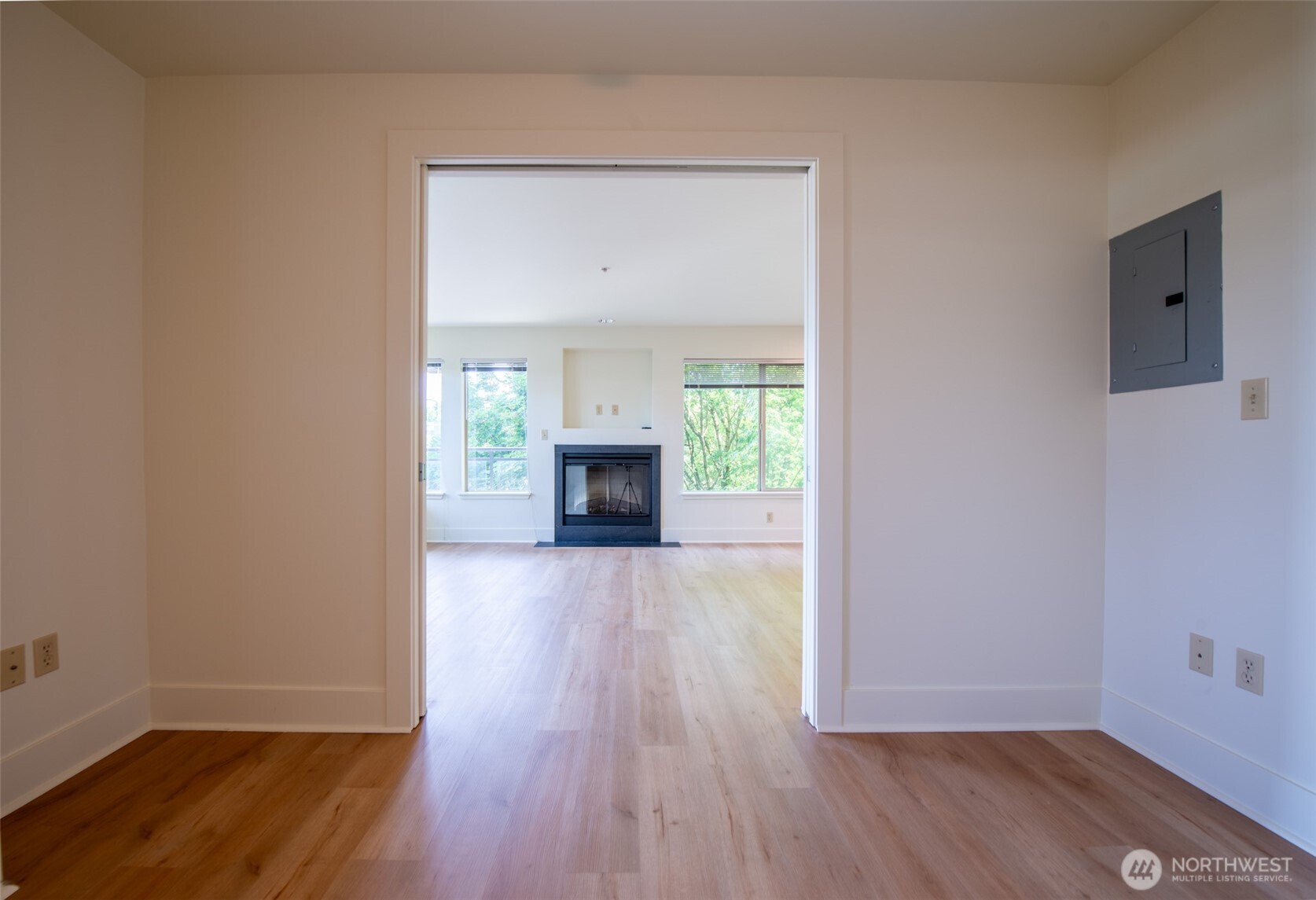 1550 Eastlake Avenue East, Unit 201 Seattle, WA 98102 - Photo 15 of 30 wooden floor in an empty room with a window