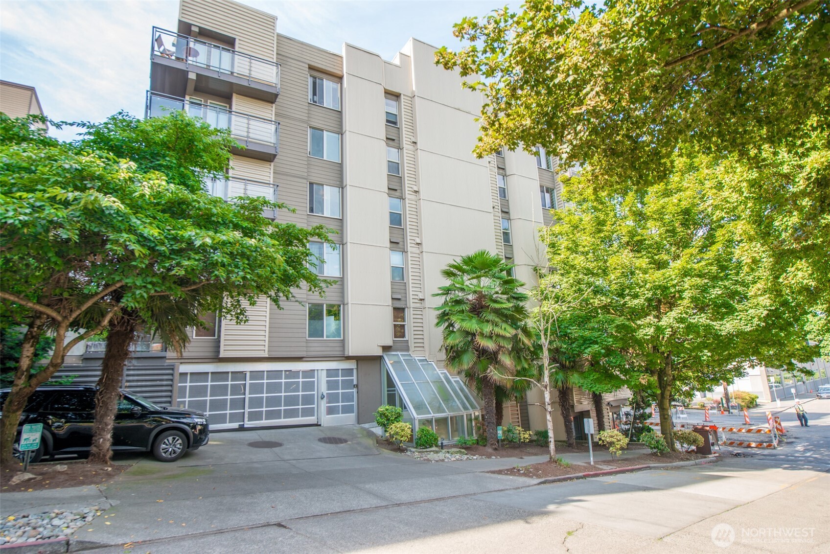 1550 Eastlake Avenue East, Unit 201 Seattle, WA 98102 - Photo 27 of 30 a view of a brick building next to a road