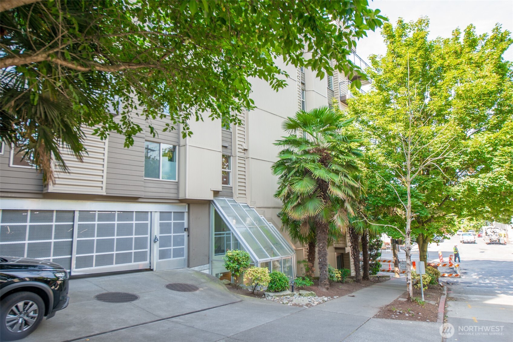 1550 Eastlake Avenue East, Unit 201 Seattle, WA 98102 - Photo 29 of 30 a view of a house with a tree