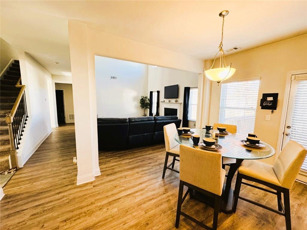 142 Wentworth Lane Villa Rica, GA 30180 - Photo 17 of 44 a view of a dining room with furniture and a window