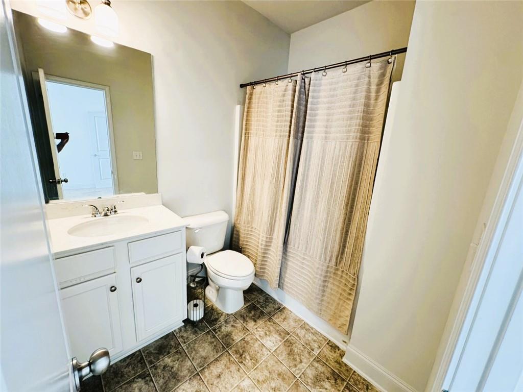 142 Wentworth Lane Villa Rica, GA 30180 - Photo 30 of 44 a bathroom with a sink and a mirror