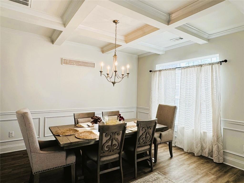 142 Wentworth Lane Villa Rica, GA 30180 - Photo 7 of 44 a view of a dining room with furniture and wooden floor