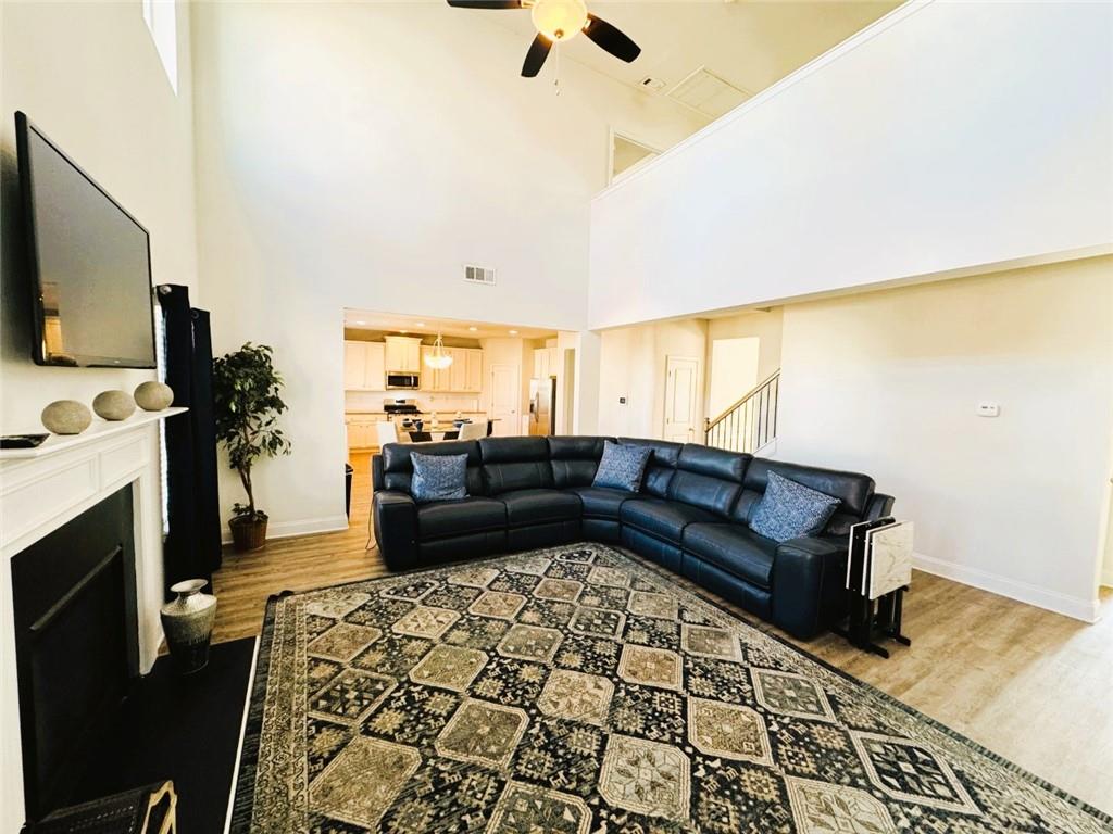 142 Wentworth Lane Villa Rica, GA 30180 - Photo 9 of 44 a living room with furniture and a flat screen tv