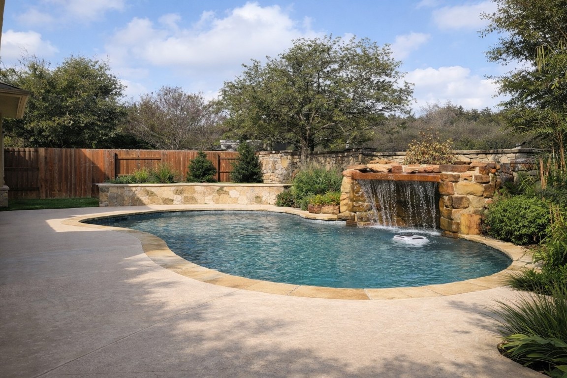 2612 Raindance Leander, TX 78641 - Photo 8 of 8 a view of a swimming pool with a patio