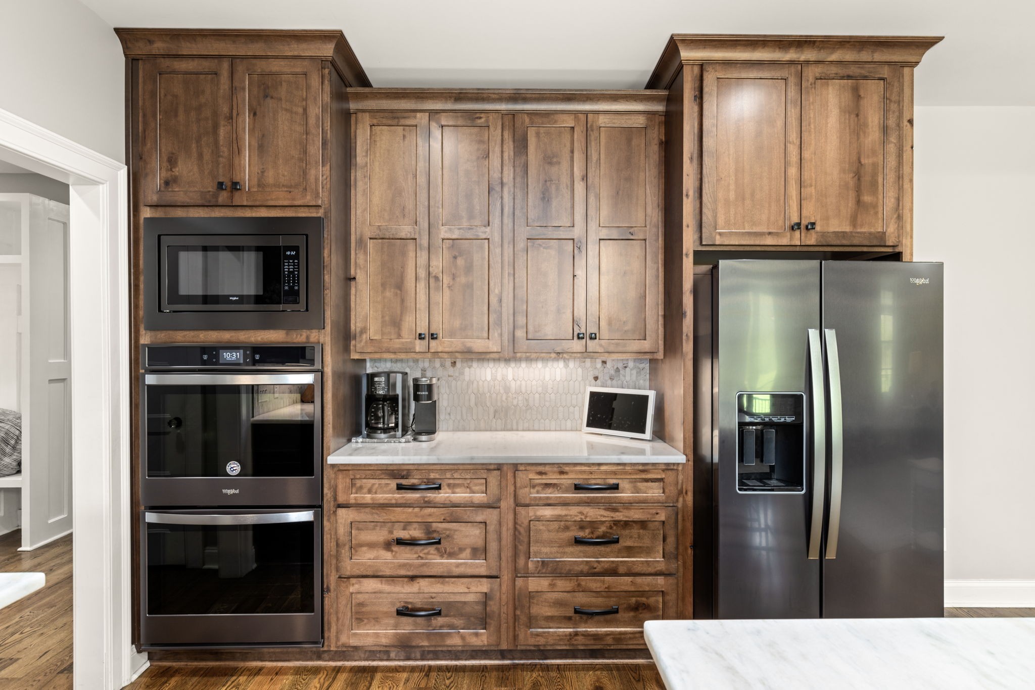 6012 Bethlehem Road Springfield, TN 37172 - Photo 11 of 60 a kitchen with stainless steel appliances kitchen island wooden cabinets and a refrigerator