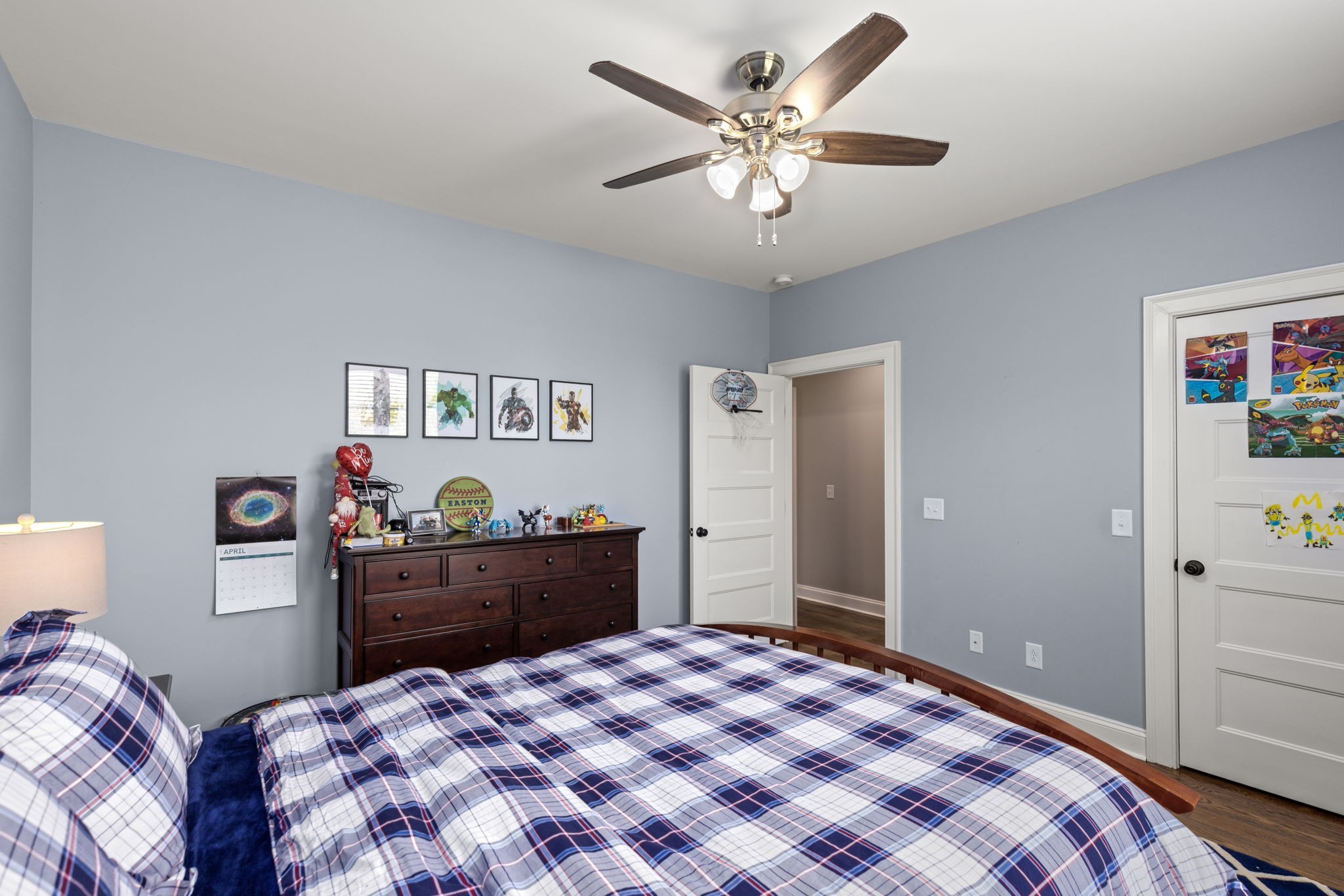 6012 Bethlehem Road Springfield, TN 37172 - Photo 29 of 60 a bedroom with a bed and a chandelier