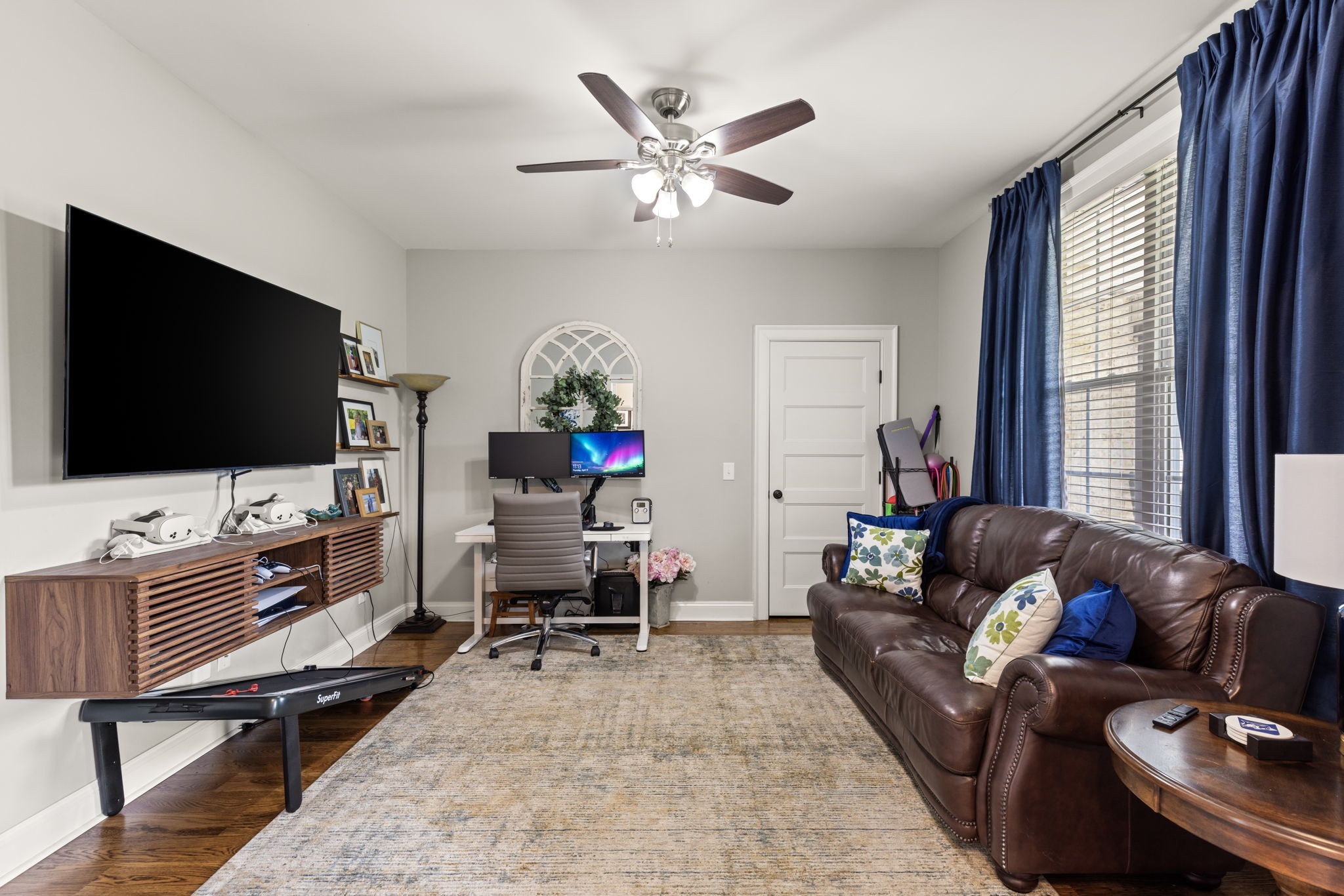 6012 Bethlehem Road Springfield, TN 37172 - Photo 30 of 60 a living room with furniture and a flat screen tv