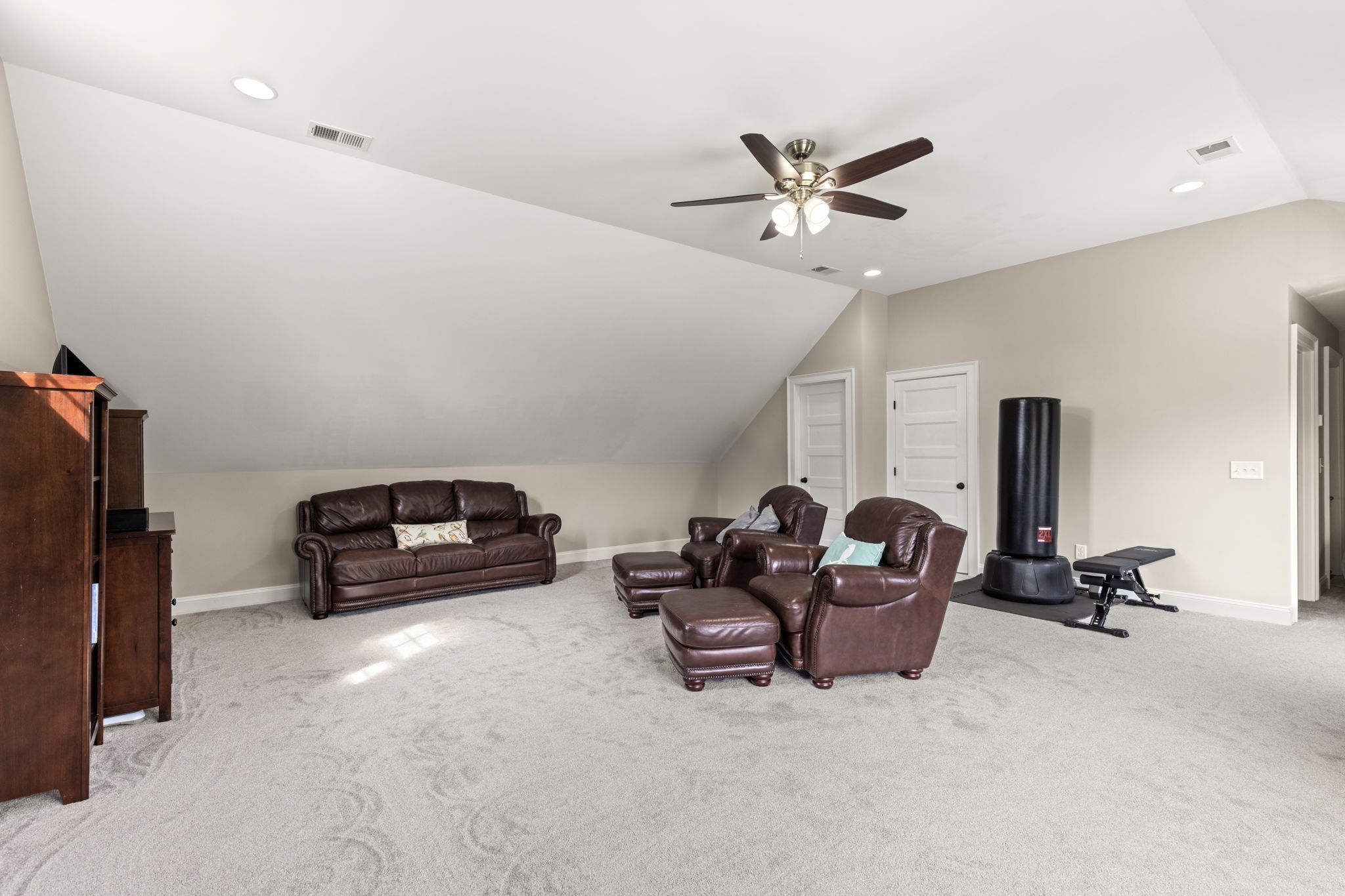6012 Bethlehem Road Springfield, TN 37172 - Photo 36 of 60 a living room with furniture gym equipment and a ceiling fan