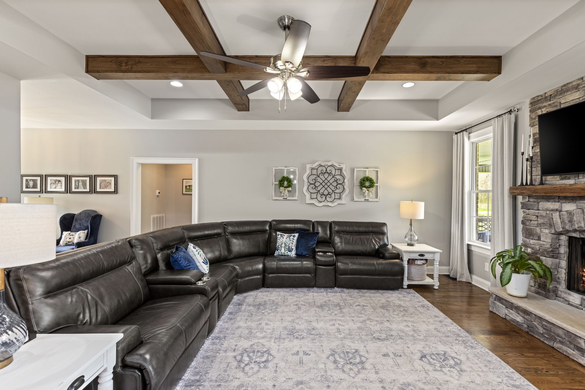 6012 Bethlehem Road Springfield, TN 37172 - Photo 7 of 60 a living room with furniture a couch and a flat screen tv