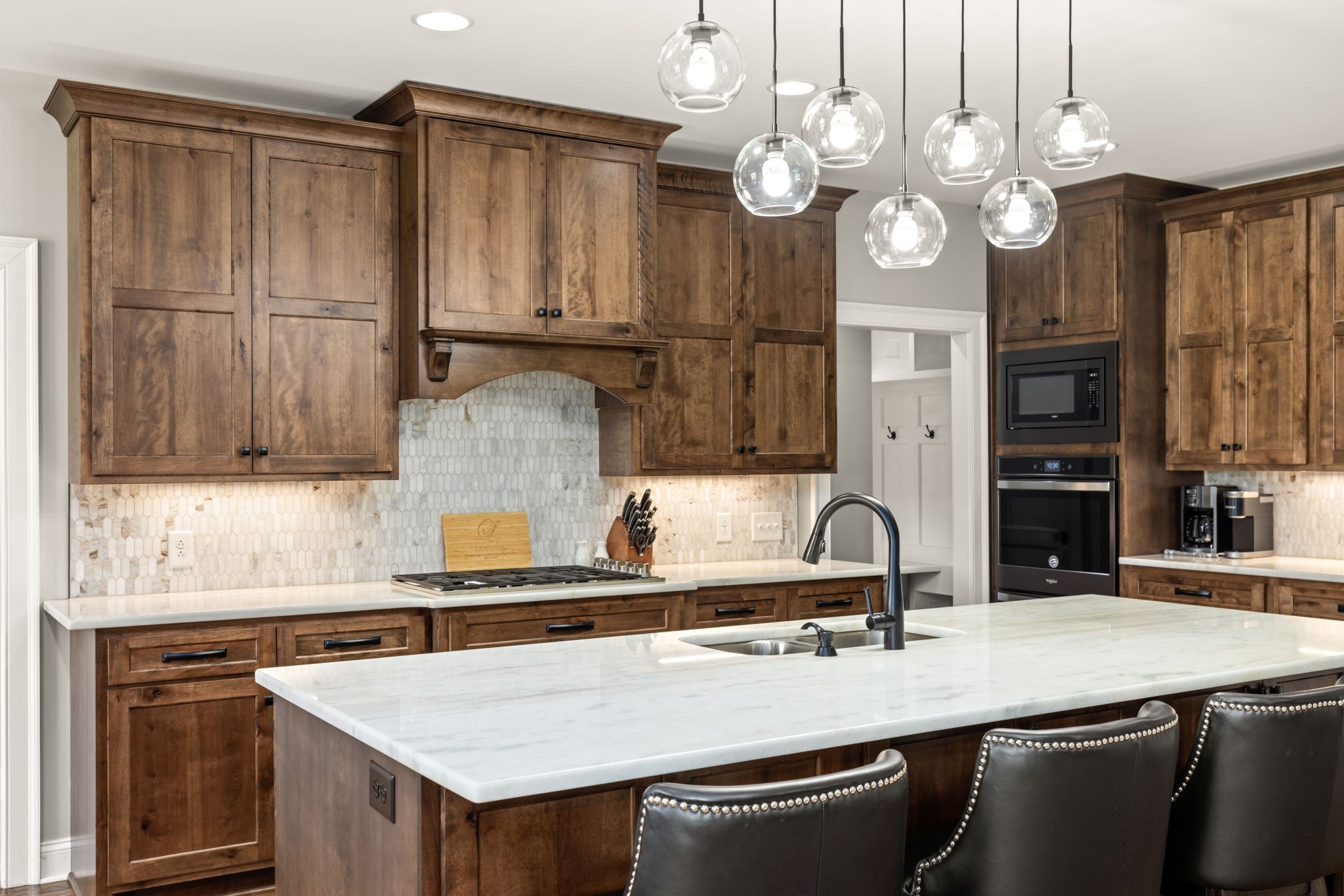 6012 Bethlehem Road Springfield, TN 37172 - Photo 9 of 60 a kitchen with cabinets and chandelier