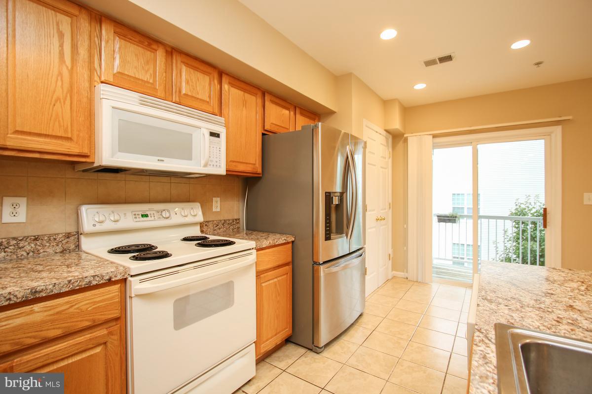2046 University Boulevard West, Unit 12 Silver Spring, MD 20902 - Photo 15 of 30 Kitchen