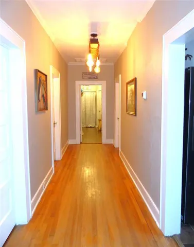 a bed room with a bed and a chair