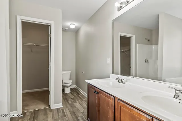 a bathroom with a bathtub and a sink