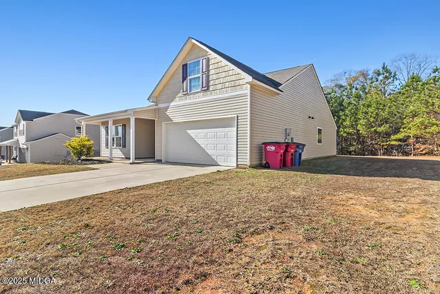 a house view with a outdoor space