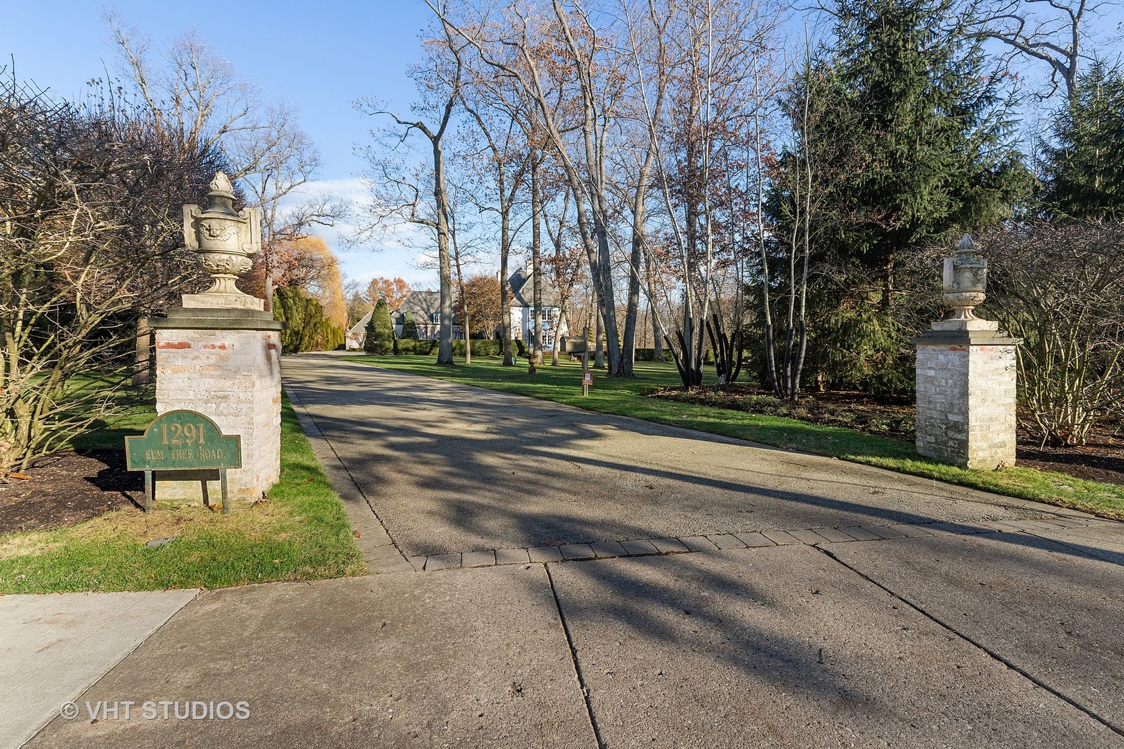 1291 Elm Tree Road Lake Forest, IL 60045 - Photo 3 of 56 a pathway of a house with a yard