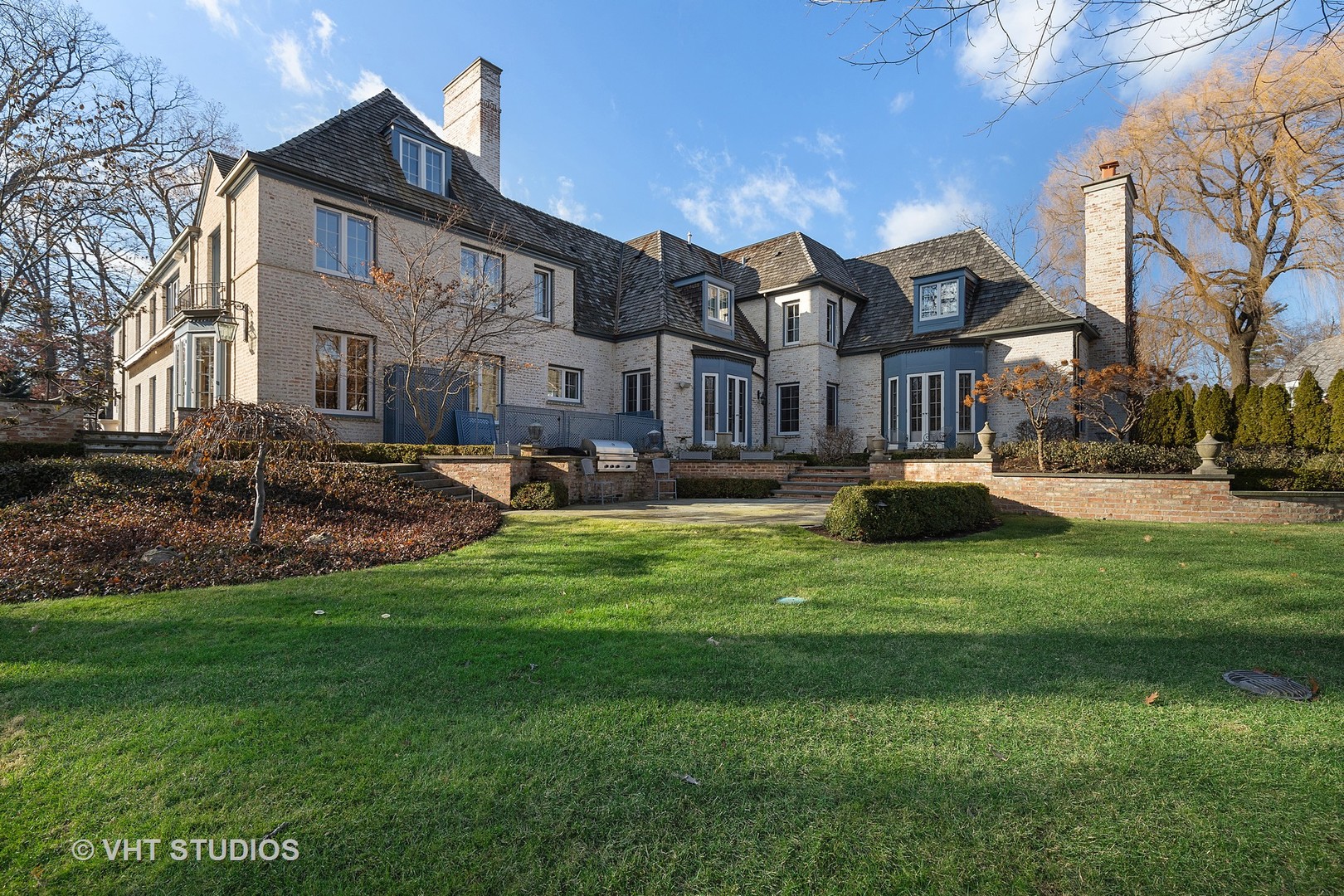 1291 Elm Tree Road Lake Forest, IL 60045 - Photo 45 of 56 a house view with swimming pool and garden space