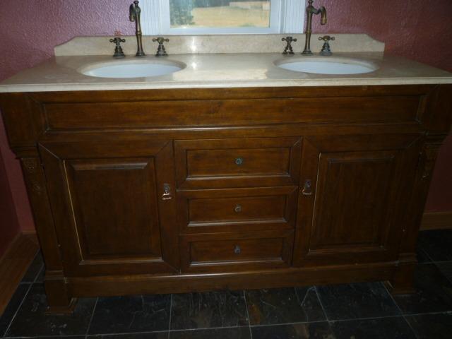 205 Latigo Ranch Road Williams, OR 97544 - Photo 28 of 50 Solid Oak with double undermount sinks, solid brass faucets and stone top.