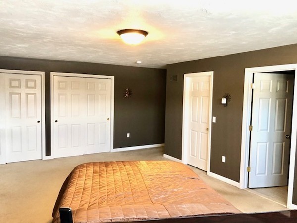 113 Ariel Circle, Unit 113 Sutton, MA 01590 - Photo 19 of 39 a view of an empty room