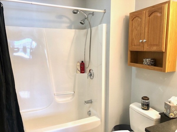 113 Ariel Circle, Unit 113 Sutton, MA 01590 - Photo 27 of 39 a bathroom with a shower and a toilet