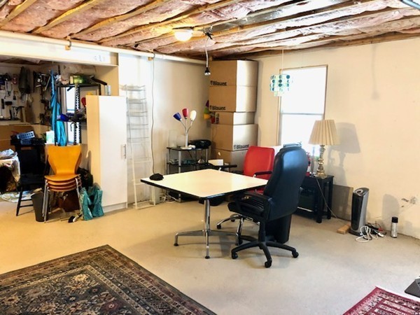 113 Ariel Circle, Unit 113 Sutton, MA 01590 - Photo 33 of 39 a view of a workspace with furniture and a window