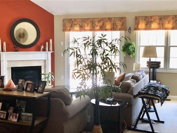 113 Ariel Circle, Unit 113 Sutton, MA 01590 - Photo 4 of 39 a living room with furniture and a fireplace