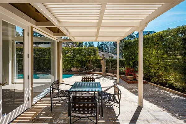 a view of swimming pool with a lounge chair