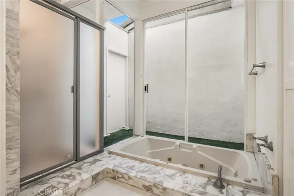 a view of staircase with railing and stairs